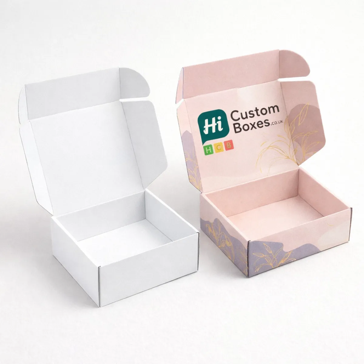 Open cardboard mailer boxes in white and lilac floral print- ideal for secure jewellery shipping- class=